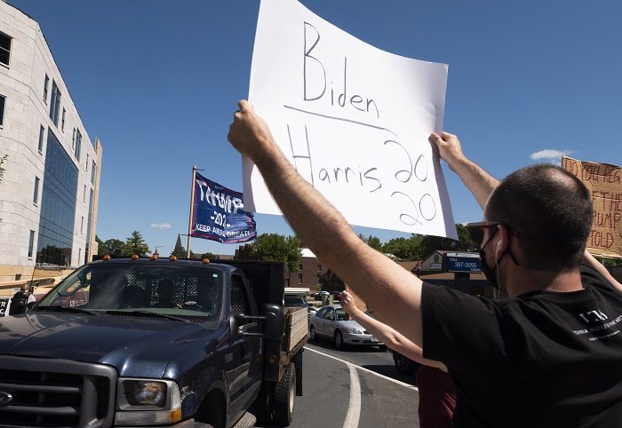 Biden Trump Sign. Getty. 9.23.30 700x482.jpg
