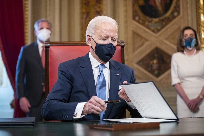 Biden.Signature.Getty .1.20.21 700x466.jpg