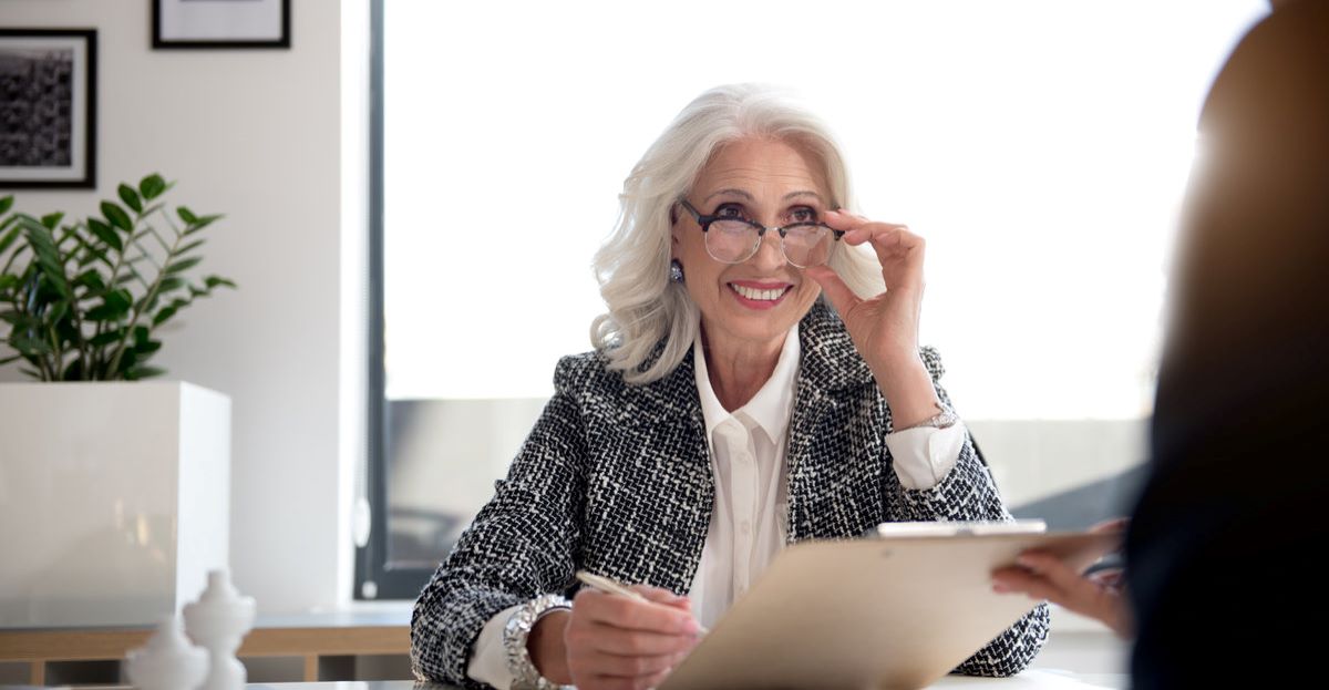 Aged Woman Smiling Hero